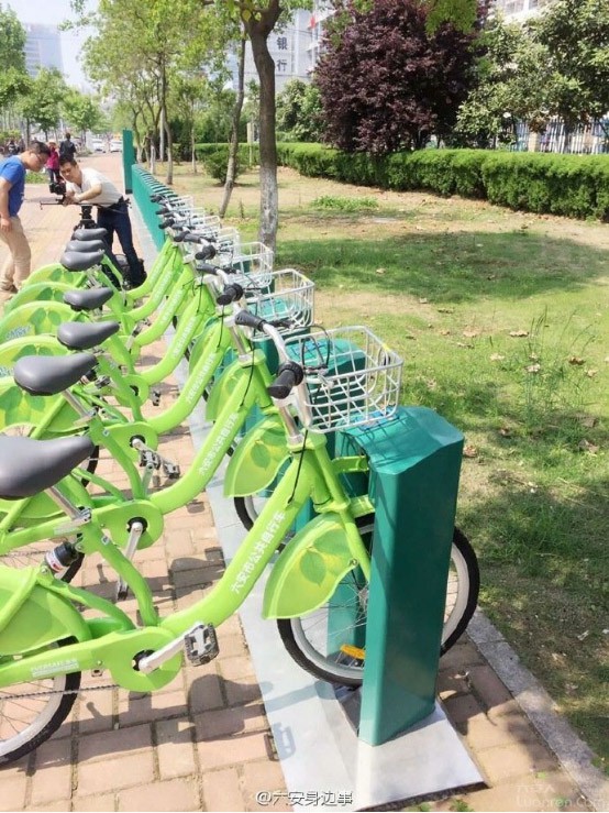 绿色骑行进社区 低碳出行更环保 六安市公共自行车走进社区听民意